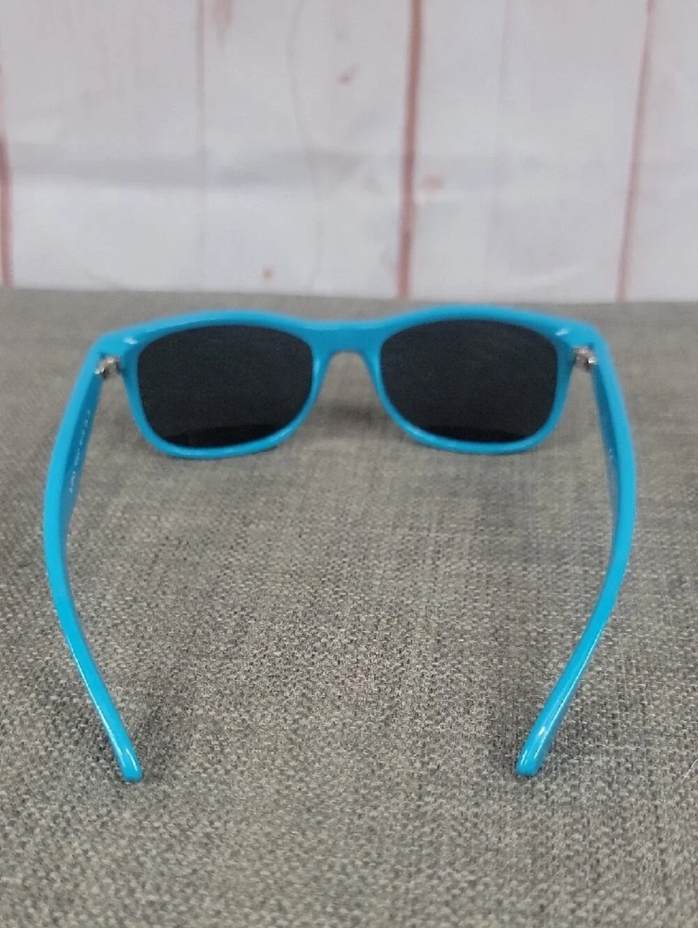 Ray-Ban Turquoise Frame Sunglasses with Dark Lenses